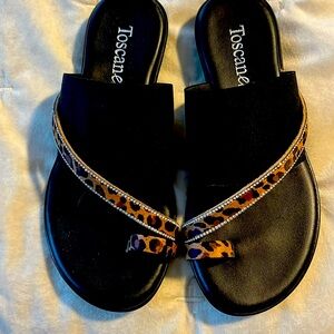 Ladies dress sandal. Black with animal print detailing.